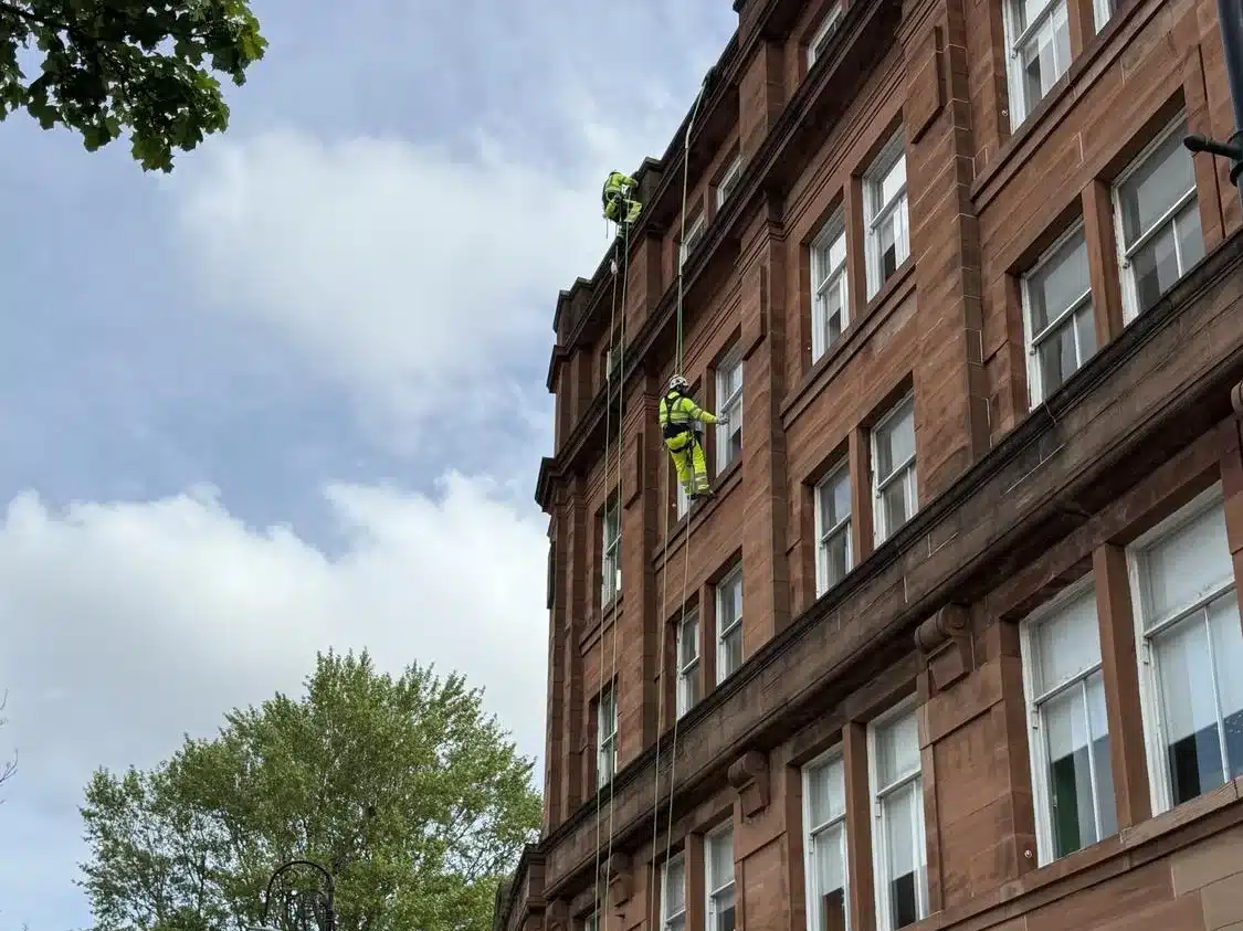 Facade repairs via rope access on the side elevation at Carlton Place